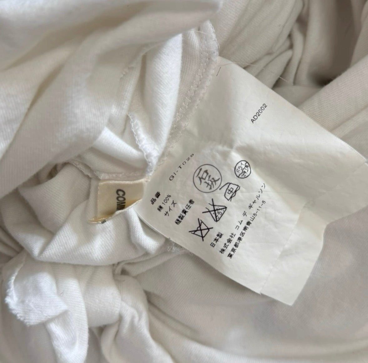 comme des garçons spring summer 2003 knotted white top
